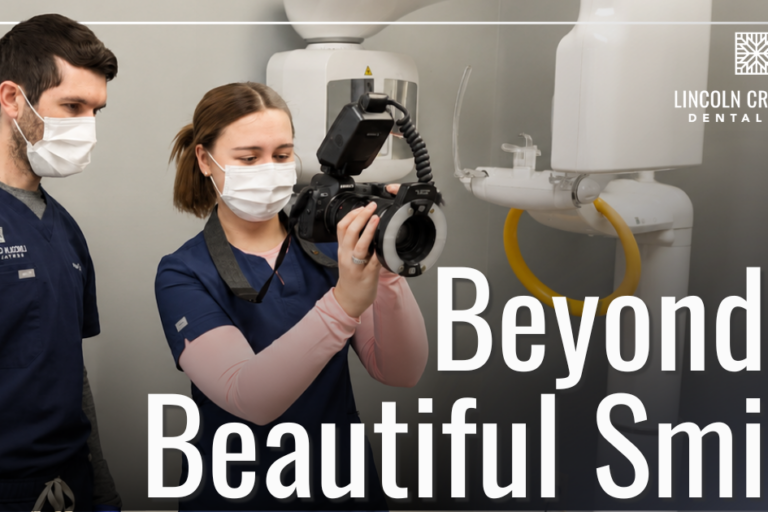 Dentist and Technician looking at dental camera