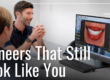 doctor smiling with patient looking at after photos