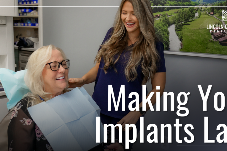 patient and hygienist smiling together